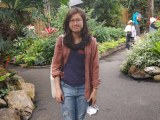 Kristy standing in a garden